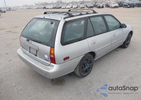 1997 Ford Escort Lx z USA, uszkodzony, nr VIN 3FALP15P7VR146235